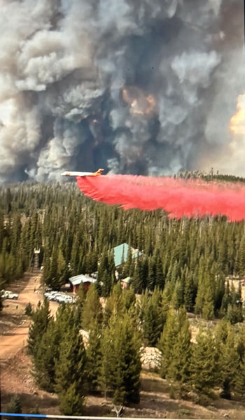 Retardant drop - Red Cliff Bible Camp. Photo by .