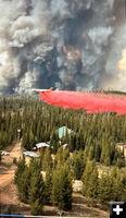 Retardant drop - Red Cliff Bible Camp. Photo by .