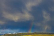 Swirly Clouds And Rainbow Shaft. Photo by Dave Bell.
